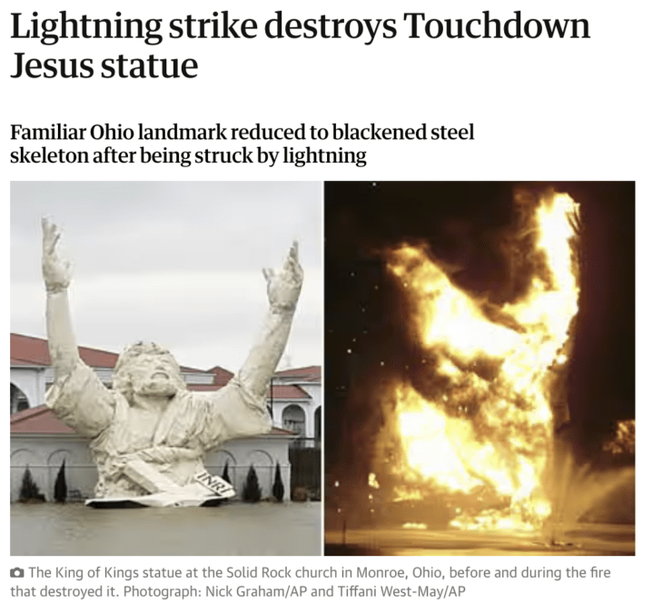 A large statue of Jesus engulfed in flames